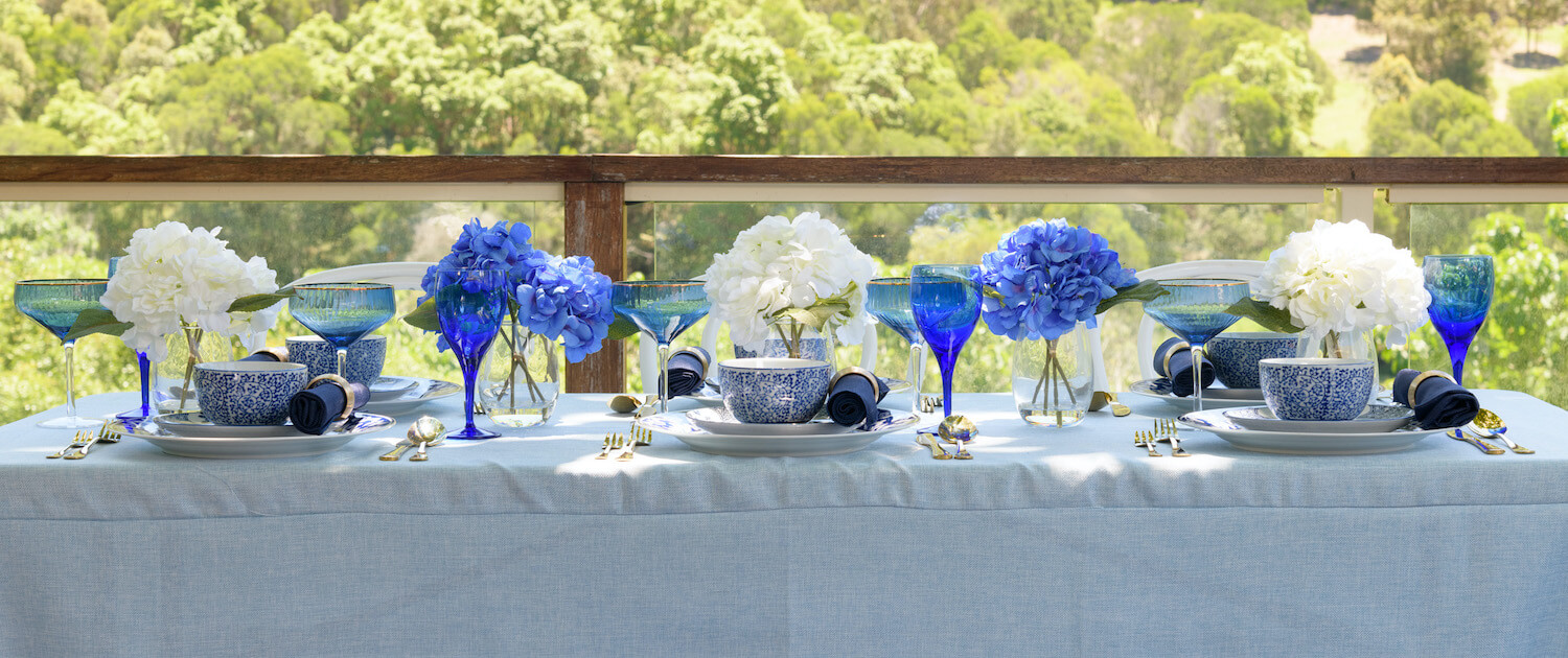 Mosaic Linen Hire Gold Coast blue and white setting